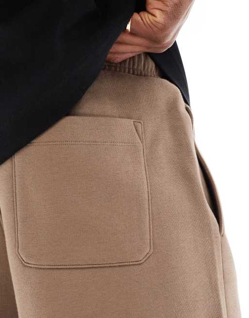ASOS DESIGN essentials mid-length oversized shorts in light brown, 4 of 5