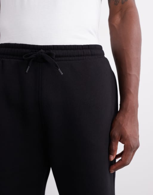ASOS DESIGN – Essentials – Mittellange Shorts in Schwarz mit schmalem Schnitt  , 6 von 6