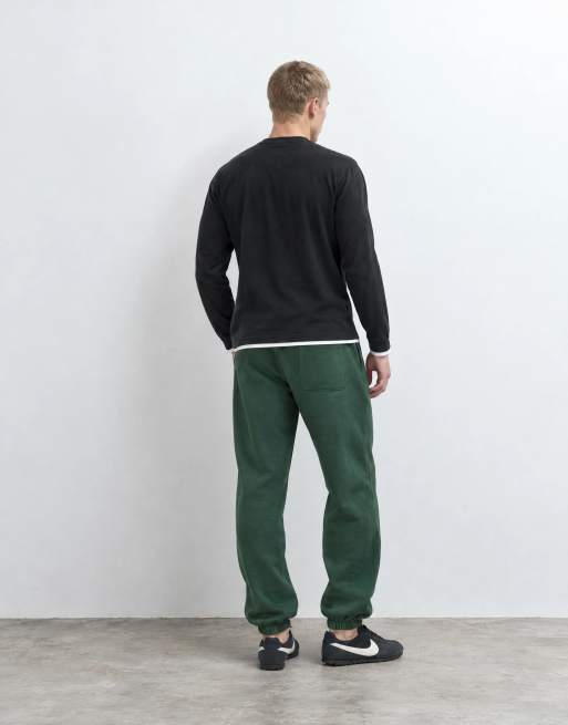 ASOS DESIGN essentials mörkgröna joggingbyxor med muddar, 9 av 9