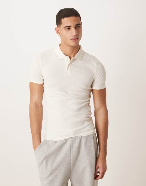 ASOS DESIGN Essentials muscle fit polo in cream rib - view 1