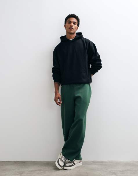 ASOS DESIGN essentials oversized balloon jogger in dark green - view 1