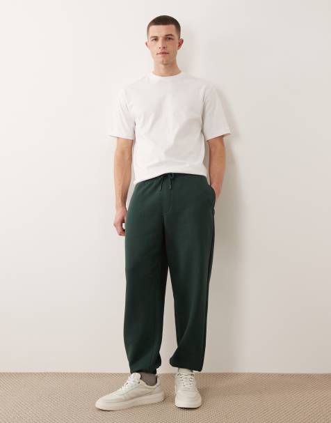 ASOS DESIGN essentials oversized joggers in dark green - view 1