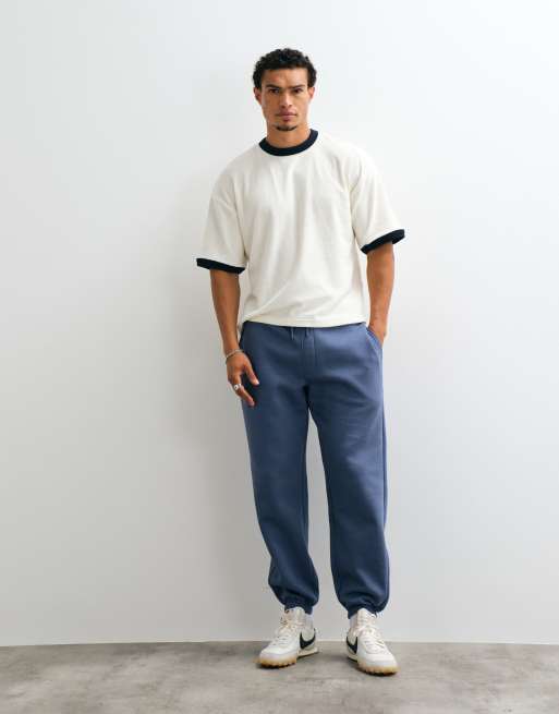 ASOS DESIGN essentials oversized joggingbukser i Vintage Indigo, 1 af 5