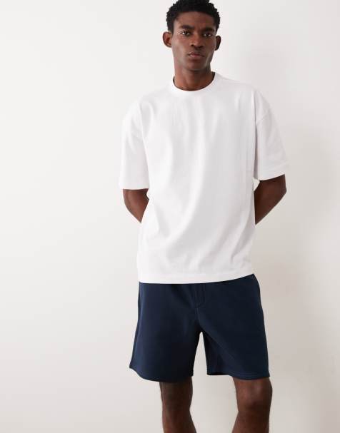 ASOS DESIGN essentials oversized mid length jersey shorts in navy - view 1
