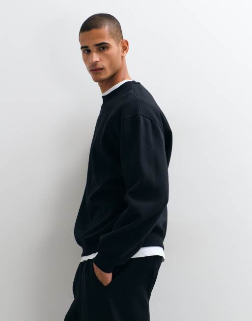 ASOS DESIGN essentials oversized sweatshirt in black, 4 of 5