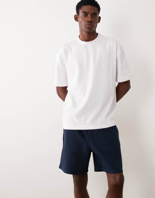 ASOS DESIGN - Essentials - Pantaloncini oversize taglio medio in jersey blu navy