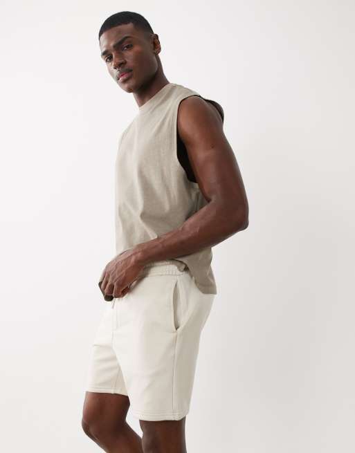 ASOS DESIGN - Essentials - Parte de un conjunto - Pantalones cortos blanco hueso básicos de corte slim y largo medio de punto liso, 3 de 5