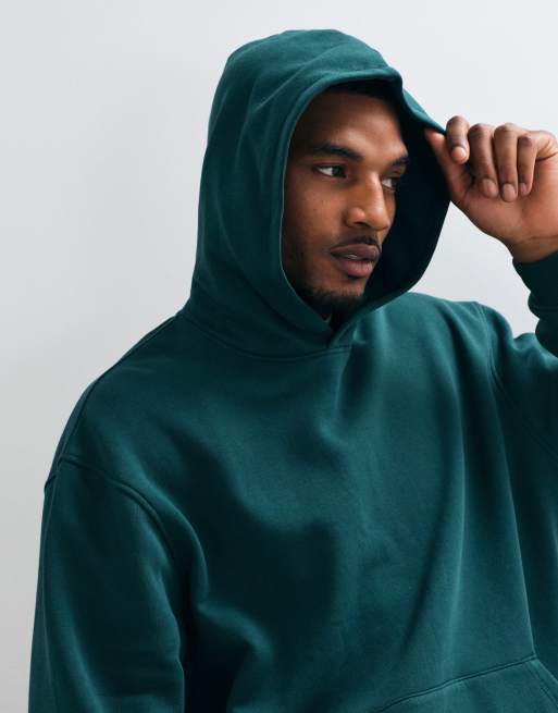 ASOS DESIGN essentials relaxed hoodie in dark green, 3 of 5