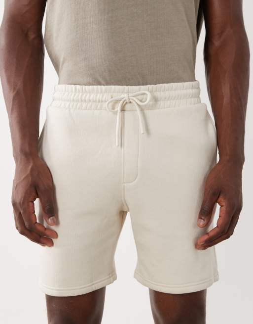 ASOS DESIGN – Essentials – Schmal geschnittene, mittellange Shorts aus Jersey in Wollweiß, Kombiteil, 4 von 5