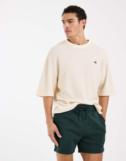 ASOS DESIGN – Essentials – Schmal geschnittene Shorts aus Jersey in Dunkelgrün, Kombiteil, 2 von 5