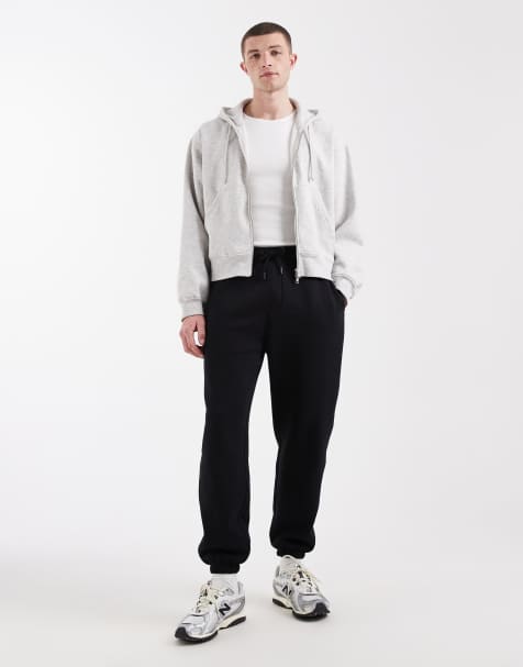 ASOS DESIGN – Essentials – Schmal zulaufende Jogginghose in Schwarz - view 1