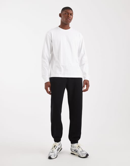 ASOS DESIGN - Essentials - Set van 2 toelopende joggingbroeken in zwart en gemêleerd grijs, 2 van 5
