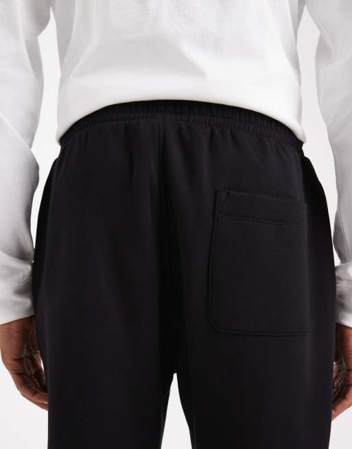 ASOS DESIGN - Essentials - Set van 2 toelopende joggingbroeken in zwart en gemêleerd grijs, 4 van 5