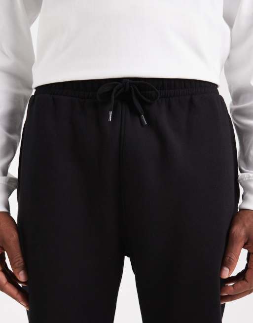 ASOS DESIGN - Essentials - Set van 2 toelopende joggingbroeken in zwart en gemêleerd grijs, 5 van 5