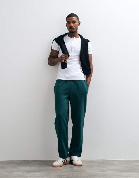 ASOS DESIGN essentials straight leg sweatpants in dark green - view 1