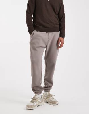 ASOS DESIGN essentials tapered fit trackies in light brown | ASOS