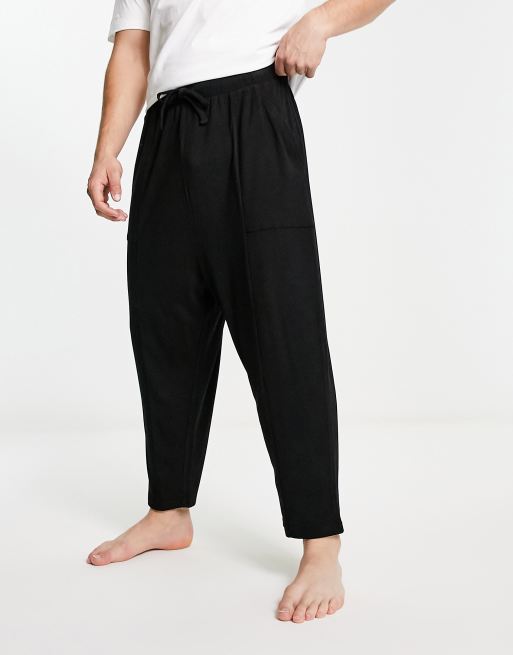 ASOS DESIGN – Essentialwear – Gerippte Lounge-Hose in Schwarz mit Ziernaht