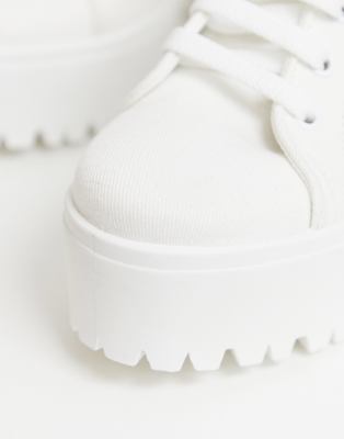 asos design sneakers in white canvas