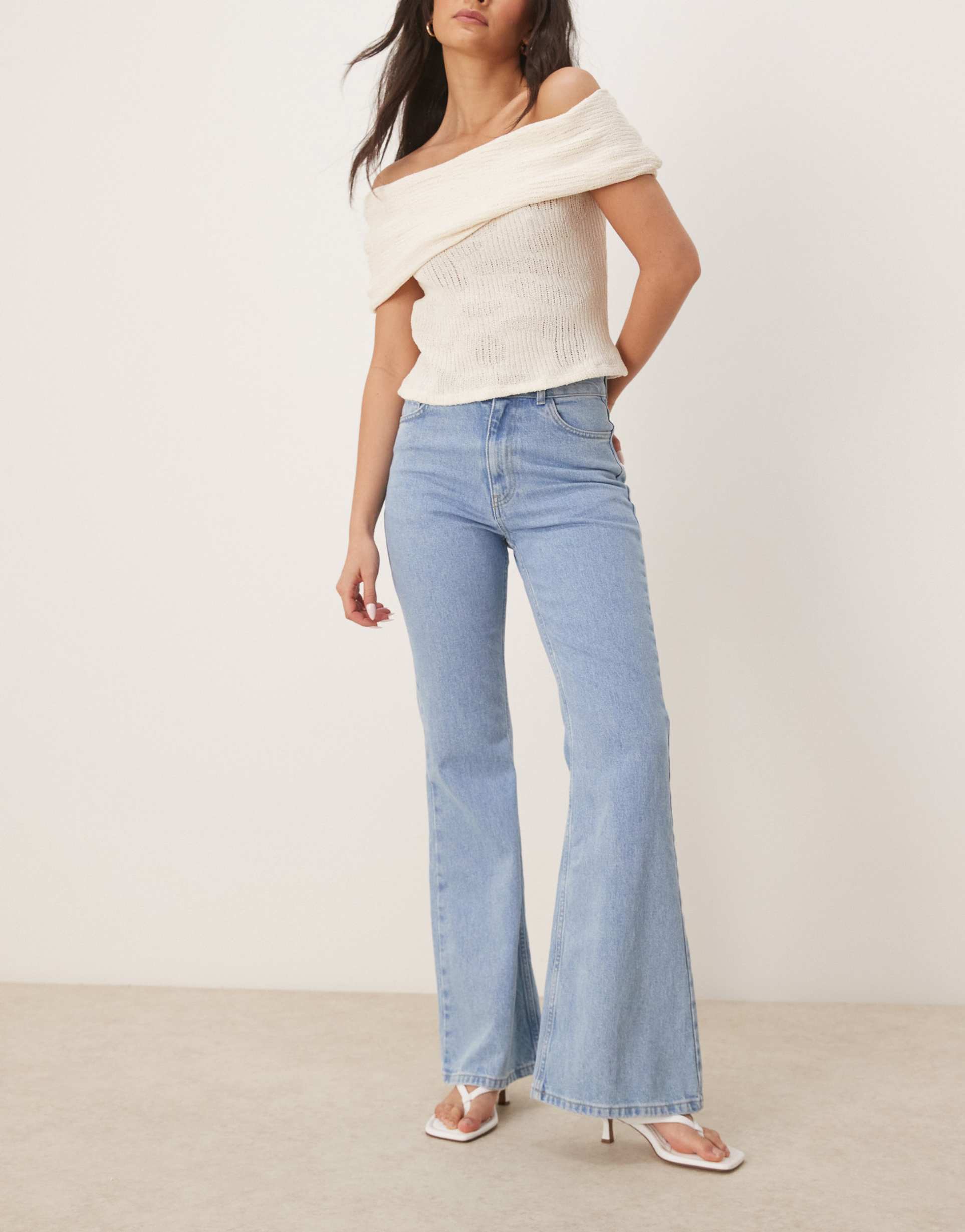 asos design everyday flare jeans in light mid blue