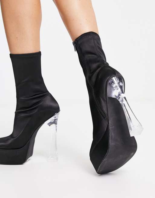 ASOS DESIGN Evidence heeled platform boots in black with clear