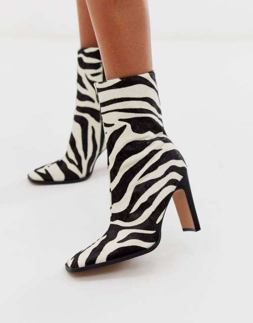 ASOS DESIGN Evolution leather high ankle boots in zebra pony