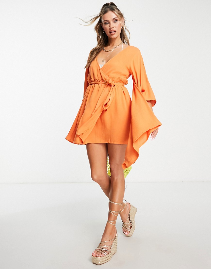 ASOS DESIGN exaggerated sleeve beach cover up in orange