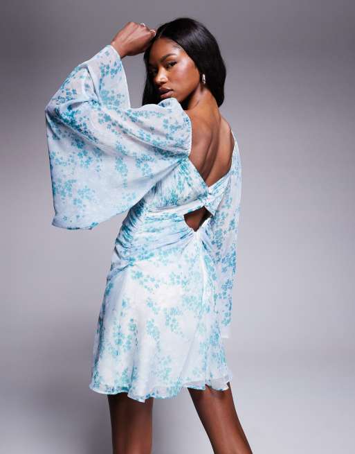 ASOS DESIGN exaggerated sleeve ruched mini dress in blue floral print 