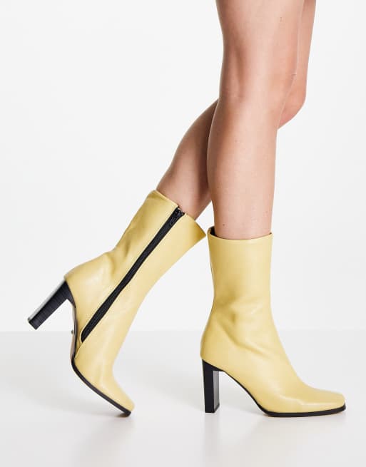 ASOS DESIGN – Expand – Stiefel in Zitronengelb mit hohem, zurückgesetztem Absatz