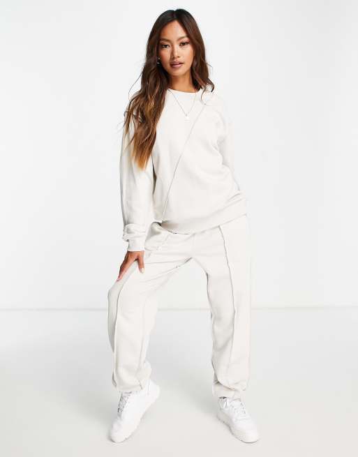 ASOS DESIGN exposed seam detail tracksuit hoodie / jogger in stone