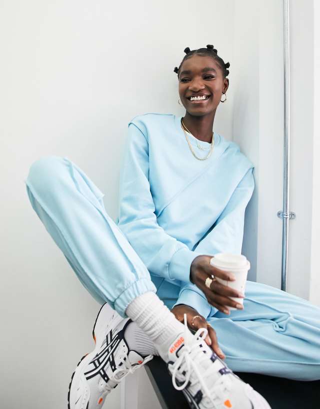 ASOS DESIGN exposed seam detail tracksuit with sweatshirt/sweatpants in ice blue