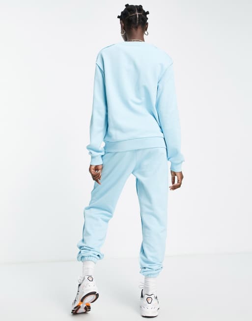 ASOS DESIGN exposed seam detail tracksuit with sweatshirt/sweatpants in ice  blue | ASOS