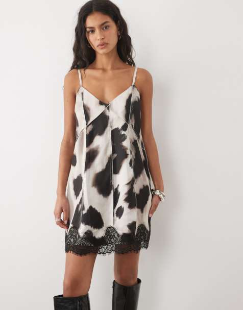 ASOS DESIGN exposed seams satin slip cami mini dress with lace trim in blurred animal print