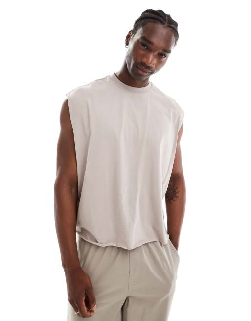 ASOS DESIGN - Extreem oversized mouwloos T-shirt met onafgewerkte randen in beige 
