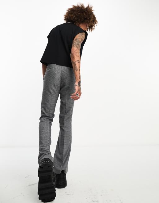 ASOS DESIGN – Extrem ausgestellte Anzughose in Schwarz mit silberfarbener Textur , 3 von 4