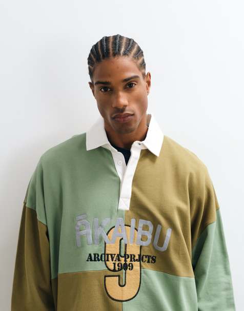 ASOS DESIGN extrem oversized Rugbyshirt mit abgestuftem Saum, Karomuster und Pigmentdruck in Khaki - view 1