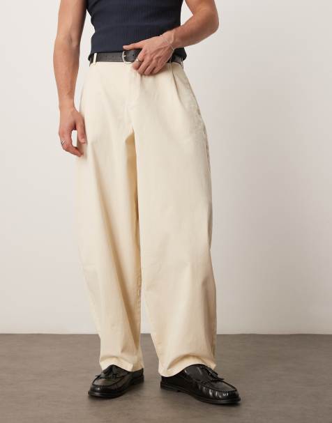 ASOS DESIGN – Extrem schmal zulaufende Hose in Beige mit Bundfalten - view 1