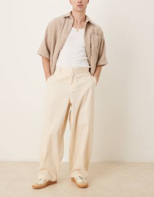 ASOS DESIGN – Extrem schmal zulaufende Hose in beigefarbener Leinenoptik - view 1