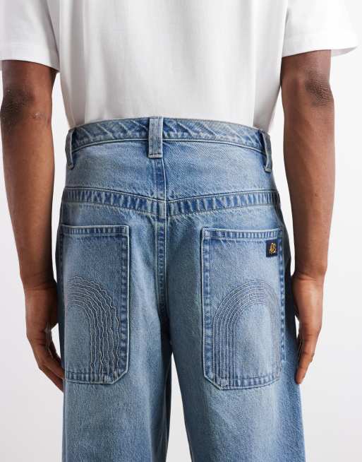 ASOS DESIGN extreme baggy fit jeans with embroidered back pocket in light wash blue , 4 of 5