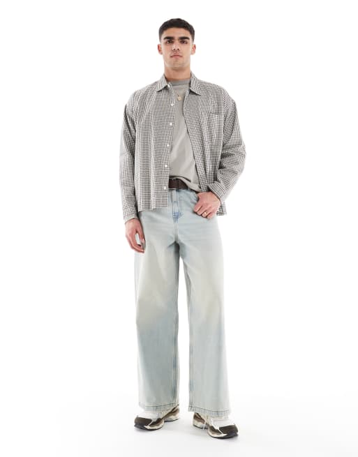 ASOS DESIGN extreme baggy fit jeans with vintage tint in light wash blue 