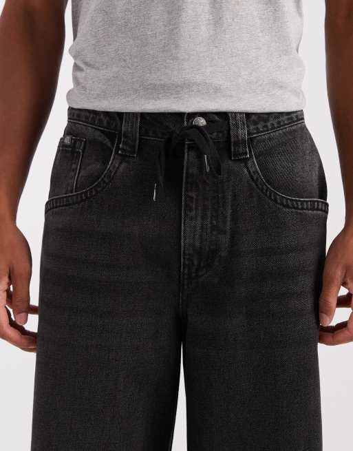 ASOS DESIGN extreme baggy jeans in washed black with embroidered back pockets and tie waist , 5 of 5