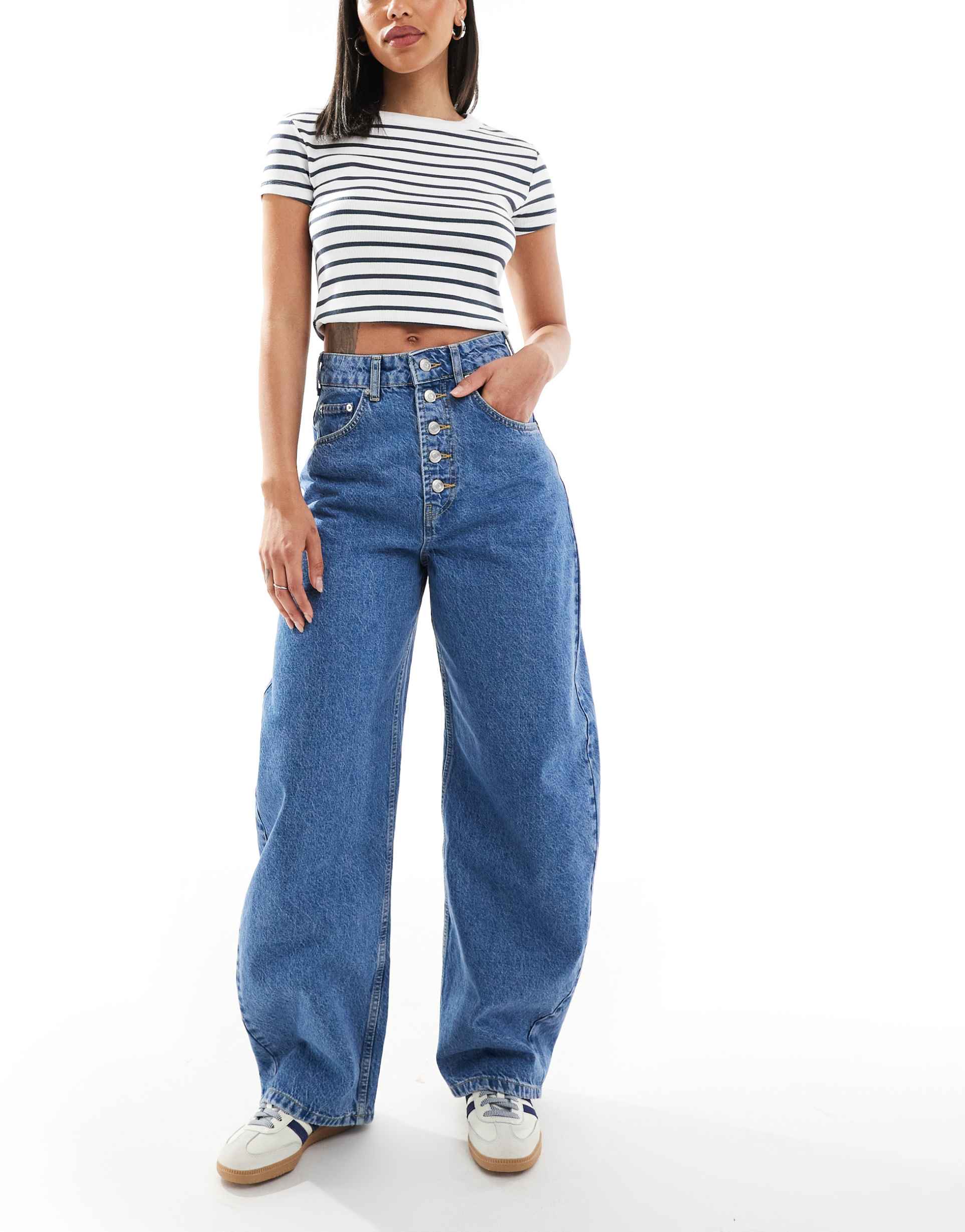 asos design extreme barrel leg jeans with button placket detail in mid blue
