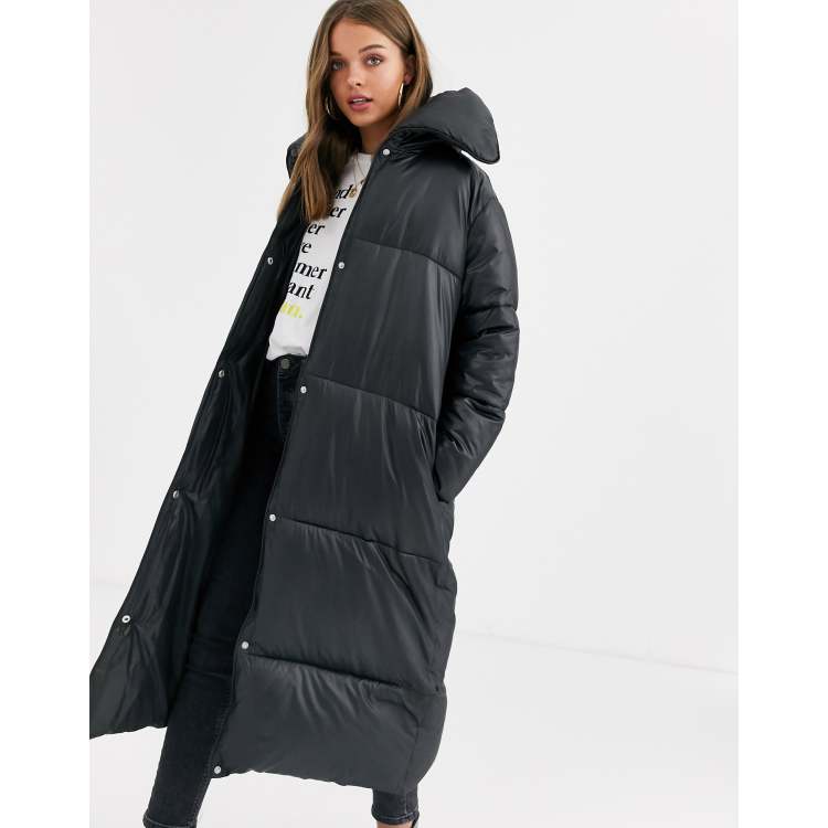 ASOS DESIGN longline puffer jacket in black monogram print