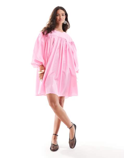 ASOS DESIGN extreme gathered smock mini dress with exaggerated sleeve and contrast bow back in pink - view 1
