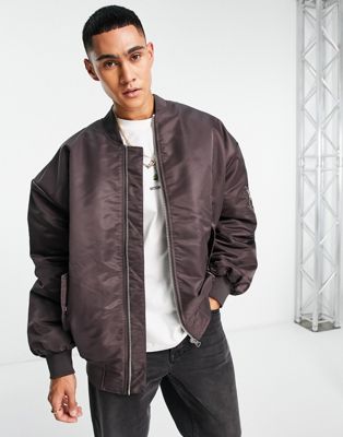 ASOS DESIGN extreme oversized bomber jacket with MA1 pocket in brown