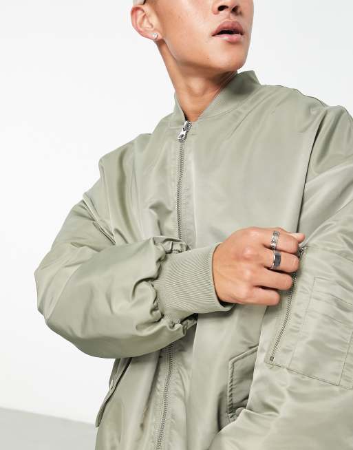 ASOS DESIGN extreme oversized bomber with MA1 pocket in green, 3 of 4