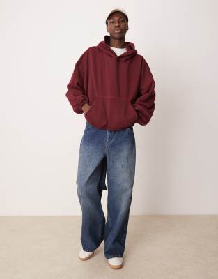 ASOS DESIGN extreme oversized boxy hoodie with underarm panels in burgundy