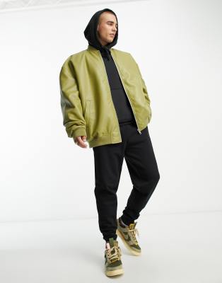 Zonsverduistering Verwachten Oceanië ASOS DESIGN extreme oversized faux leather bomber jacket in green | ASOS