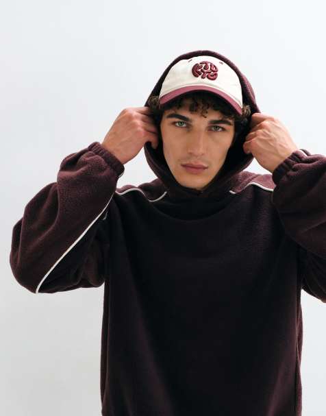 ASOS DESIGN extreme oversized fleece hoodie with cut and sew panels and piping in brown - view 1