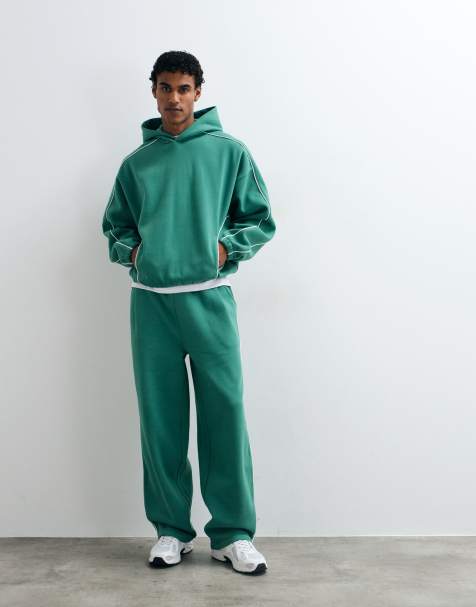 ASOS DESIGN extreme oversized hoodie and super baggy sweatpants set with piping in green - view 1