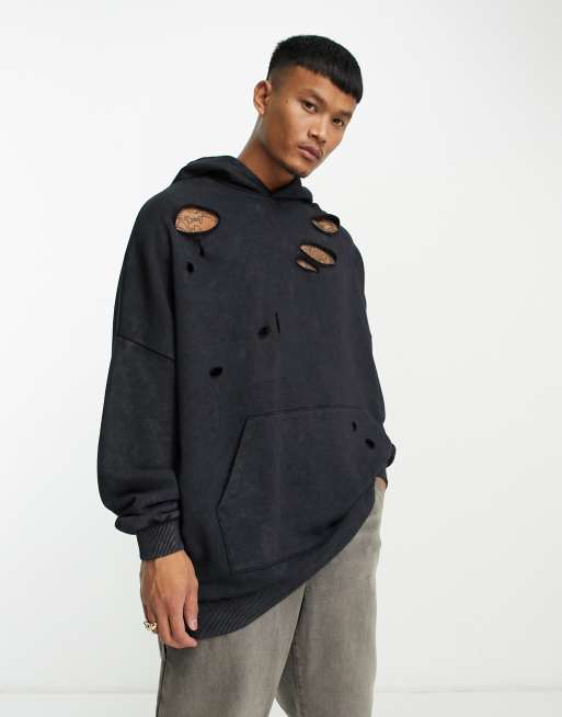 ASOS DESIGN extreme oversized hoodie in washed black with distressing